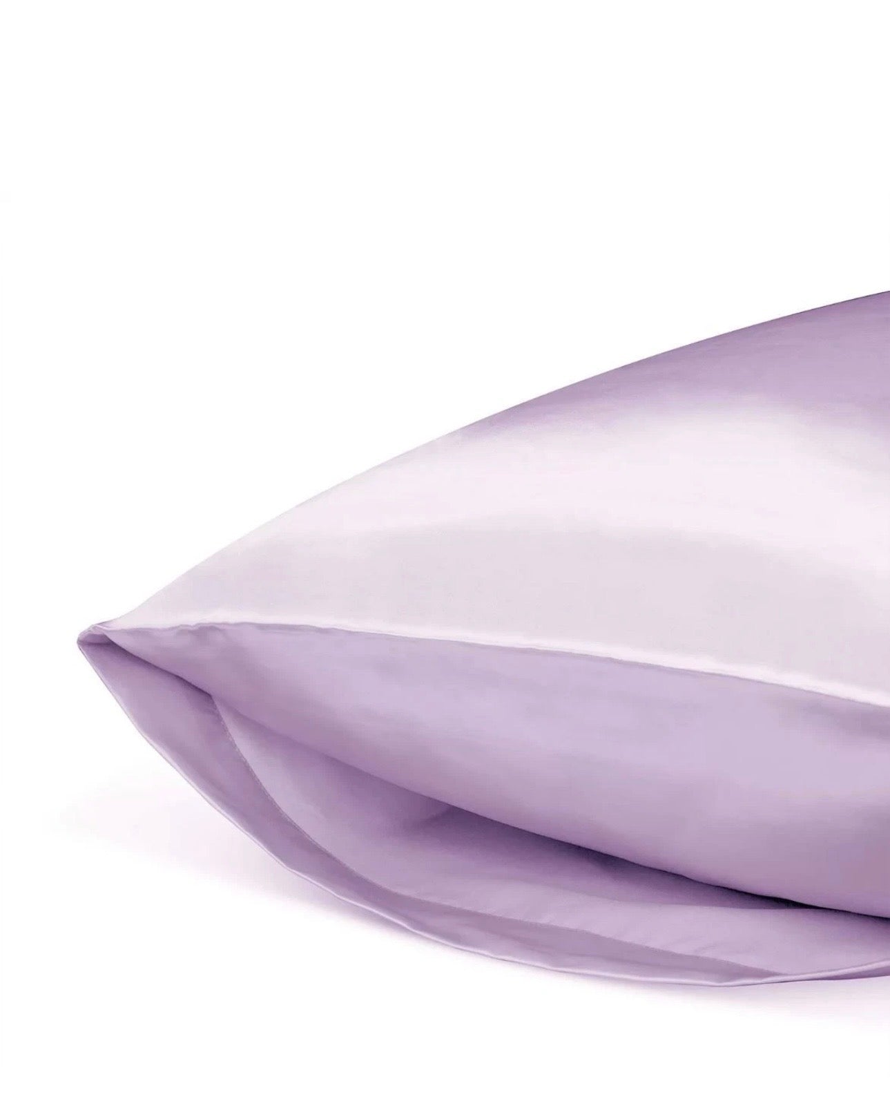 Close-up of a purple satin pillow on a white background