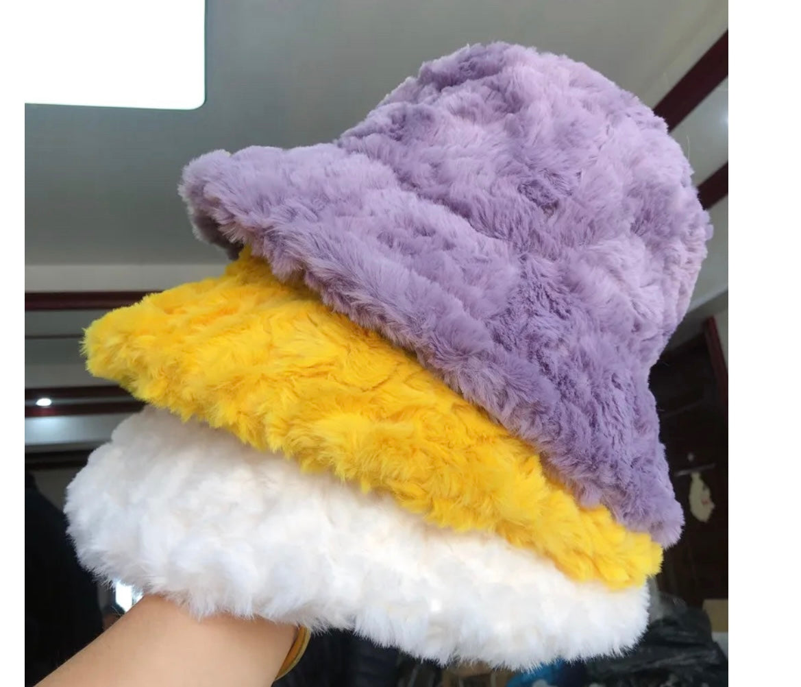 3 faux fur hats purple white and yellow